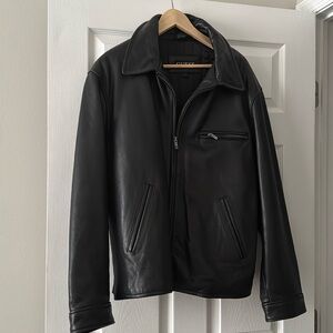 Men’s guess black leather jacket size large.